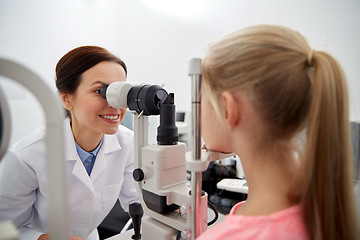 Image showing optician with tonometer and patient at eye clinic