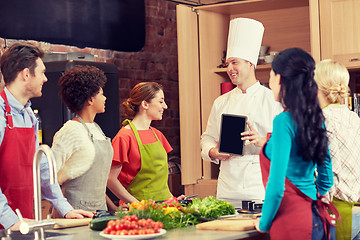 Image showing happy friends with chef and tablet pc in kitchen