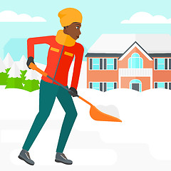 Image showing Woman shoveling and removing snow.