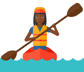 Image showing Woman riding in canoe.