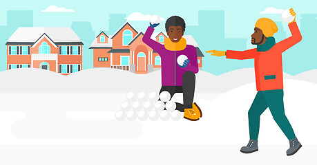 Image showing Men playing in snowballs.