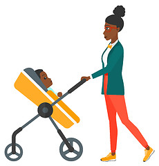 Image showing Woman pushing pram.