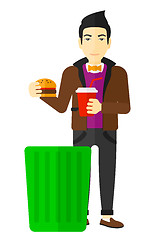 Image showing Man throwing junk food.