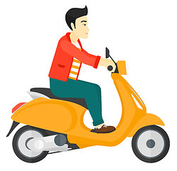 Image showing Man riding scooter.