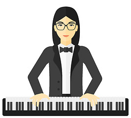 Image showing Woman playing piano.