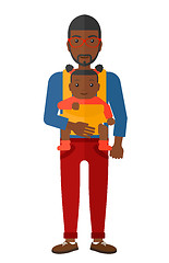 Image showing Man holding baby in sling.