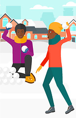 Image showing Couple playing in snowballs.