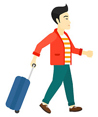 Image showing Man walking with suitcase.
