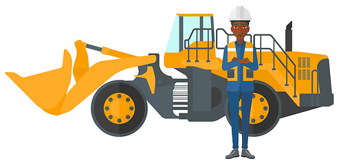 Image showing Miner with mining equipment on background.