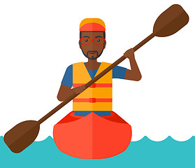 Image showing Man riding in canoe.