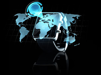 Image showing close up of smart watch with world map projection