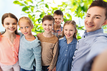 Image showing happy children talking selfie