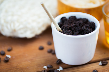 Image showing close up of coffee scrub in cup on wooden table