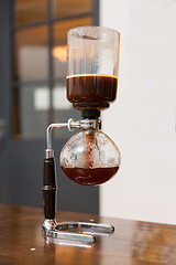 Image showing close up of siphon vacuum coffee maker at shop