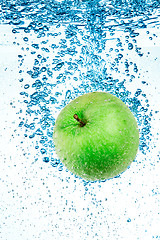 Image showing Green Apple in the Water.