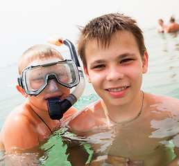 Image showing Two boys on a beach