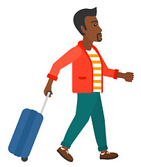 Image showing Man walking with suitcase.