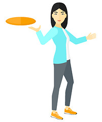 Image showing Woman playing frisbee.