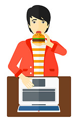 Image showing Man eating hamburger. 