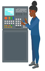 Image showing Engineer standing near control panel.