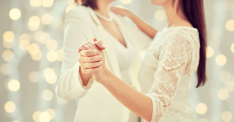 Image showing close up of happy married lesbian couple dancing