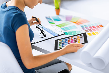 Image showing woman working with color samples for selection