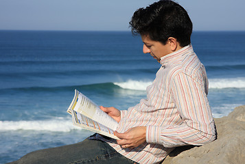 Image showing Readind a book