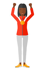 Image showing Athlete with medal and hands raised.