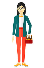 Image showing Woman with pack of beer.