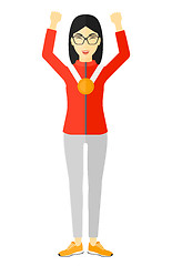 Image showing Athlete with medal and hands raised.