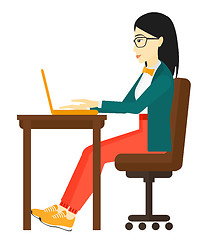 Image showing Woman working at laptop.