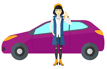 Image showing Woman holding key from new car.