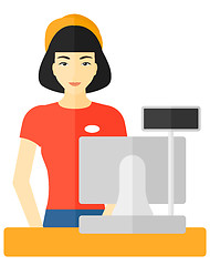 Image showing Saleslady standing at checkout.