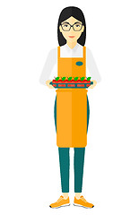 Image showing Smiling supermarket worker.