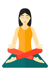 Image showing Woman meditating in lotus pose.