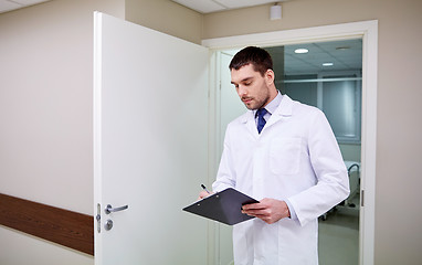 Image showing doctor with clipboard at hospital