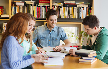 Image showing students with books preparing to exam in library