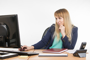 Image showing Haughty a specialist office working on the computer