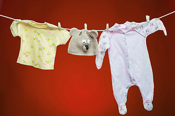 Image showing Baby goods hanging on the clothesline