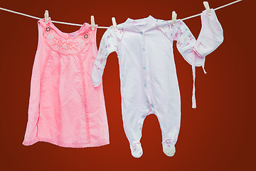 Image showing Baby goods hanging on the clothesline