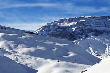 Image showing Ski resort and sunlight rocks at evening