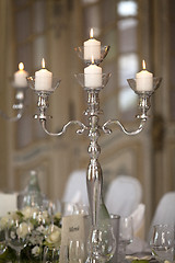Image showing Candles at a laid table