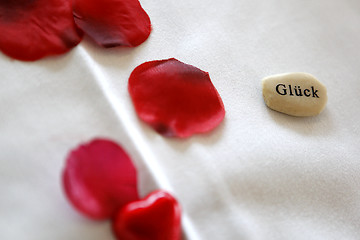 Image showing Happiness written on a stone