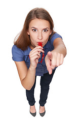 Image showing Female blowing a whistle and pointing at you