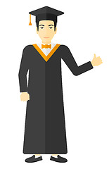 Image showing Graduate showing thumb up sign.