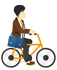 Image showing Man cycling to work.