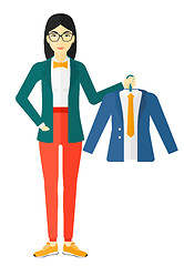 Image showing Woman holding jacket.