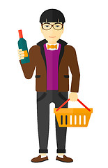 Image showing Customer with shopping basket and bottle of wine.