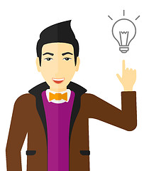 Image showing Man pointing at light bulb.
