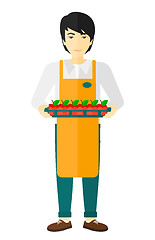 Image showing Smiling supermarket worker.